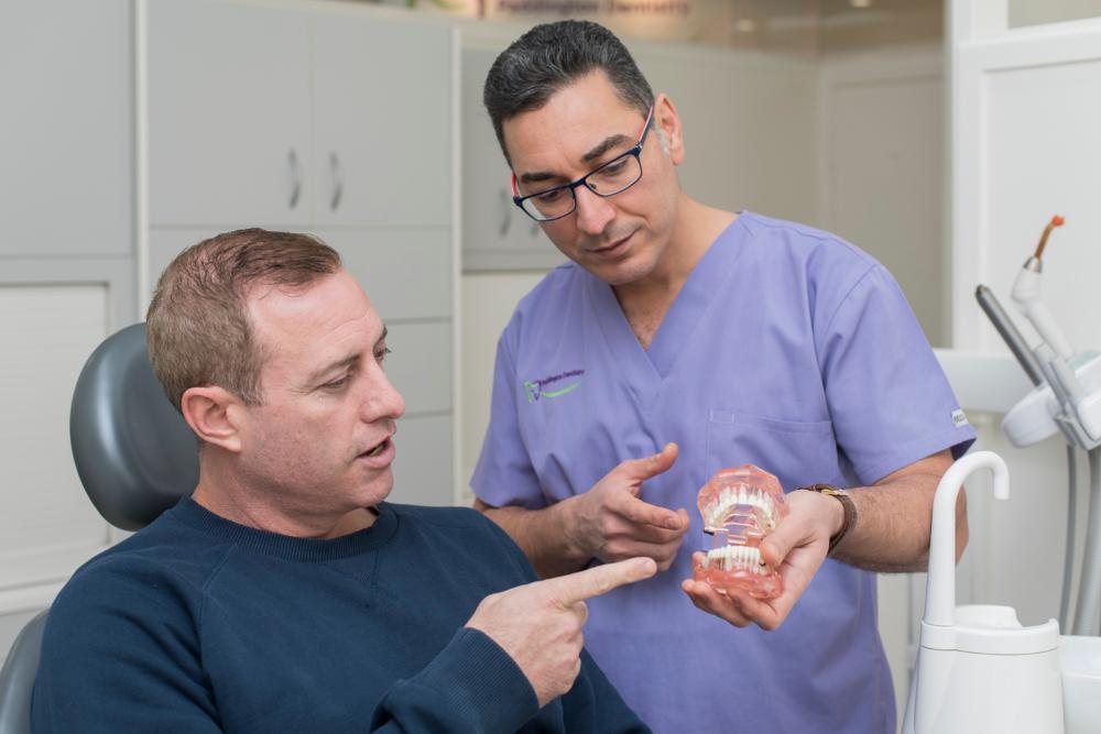 Doctor explaining preventive dental procedure to patient