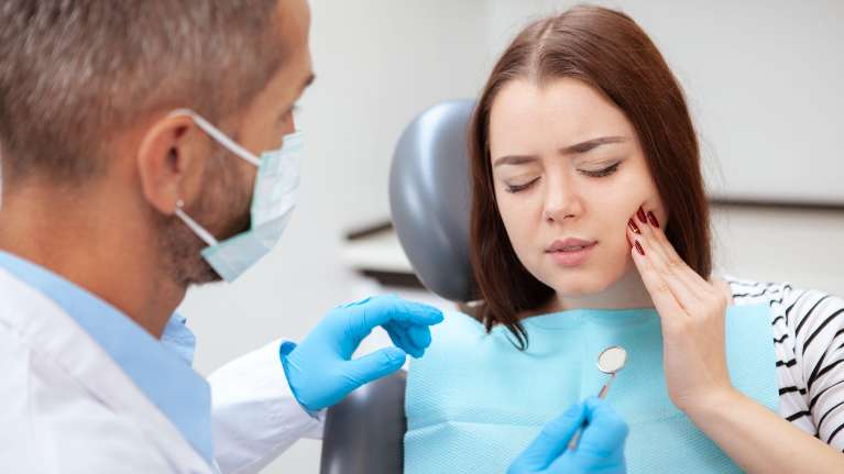 Girl Seeking Emergency Dental Care For Tooth Pain | Paddington Dentistry